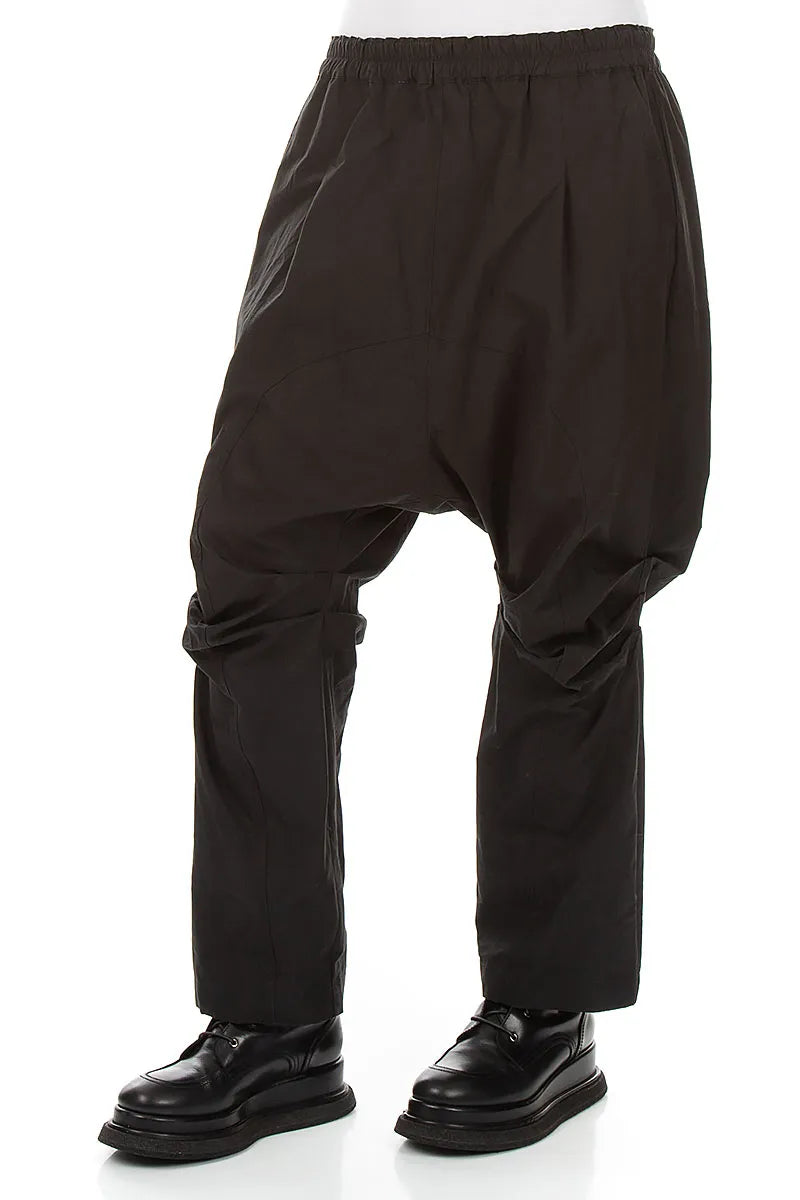 Hosen aus schwarzem Baumwoll-Twill mit Raffungen am Knie
