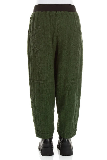 Leinenhose aus kleeblattgrünem Mélange mit Knopfleiste vorne