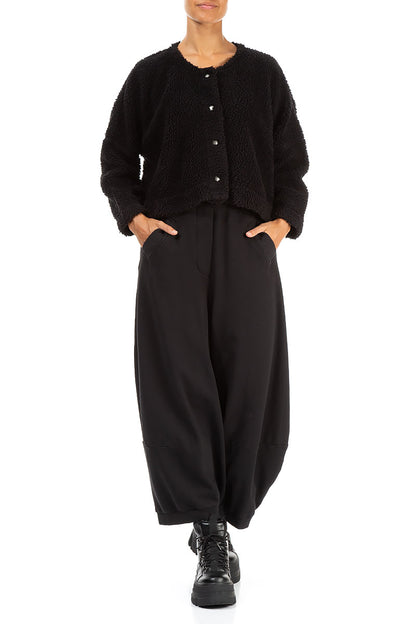Schwarze Teddy-Baumwolljacke mit Druckknopfverschluss vorne