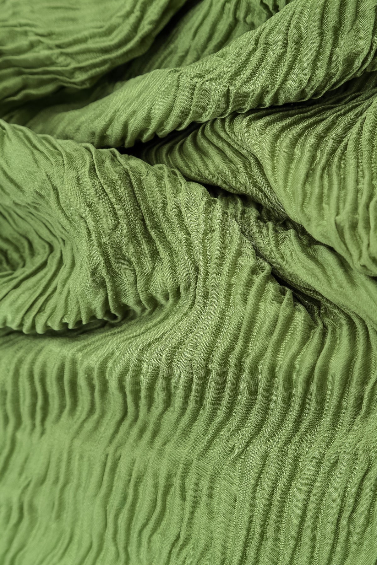 Kleeblattgrüne Plissé-Seidenbluse mit Seitentaschen